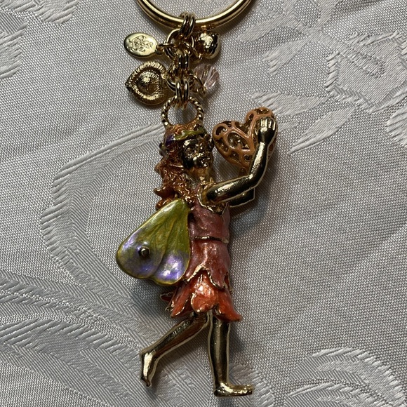 KIRK’S FOLLY gt fairy keychain holding heart with 4 sm. charms.    $25 - Picture 3 of 7
